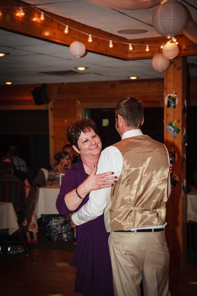 Mother and groom dance